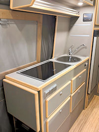 Grigio HPL with maple mouldings, Grigio worktop, light-coloured strip flooring